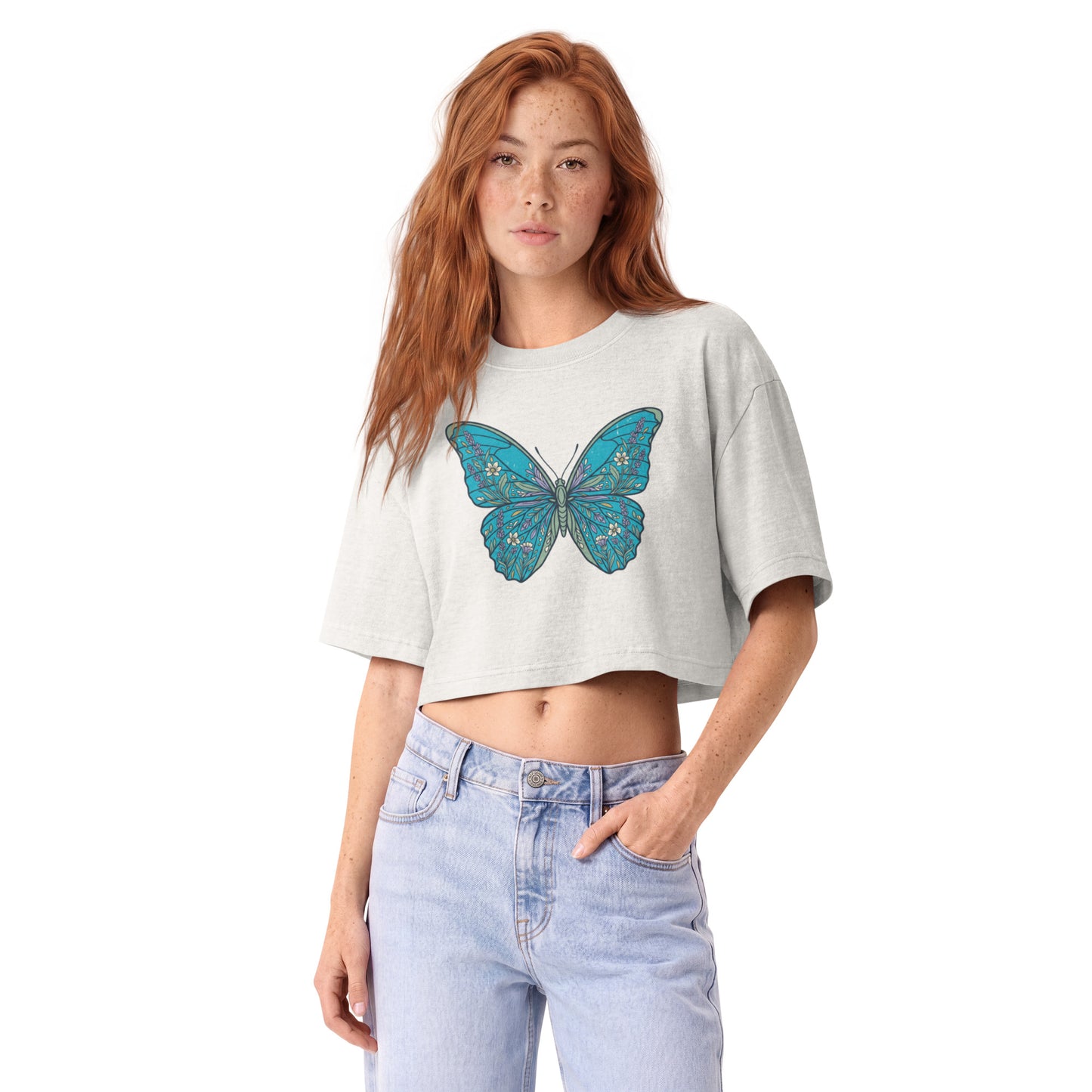 Detailed teal morpho butterfly printed on a vintage white garment-dyed cropped tee, front view