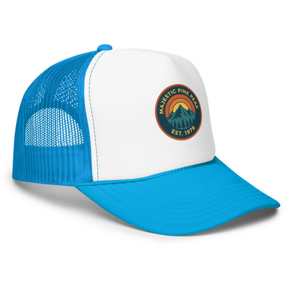 Blue and white retro mountain sunset trucker hat with mesh back, angled view