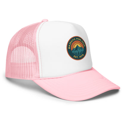 Light pink and white retro mountain sunset trucker hat, angled front view