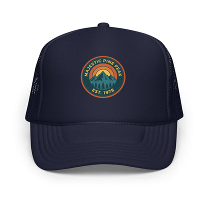 Navy retro mountain sunset trucker hat, front view of vintage hiking graphic