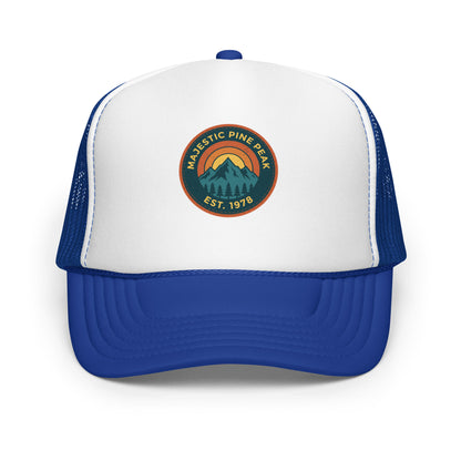 Royal blue and white retro mountain sunset trucker hat, front view