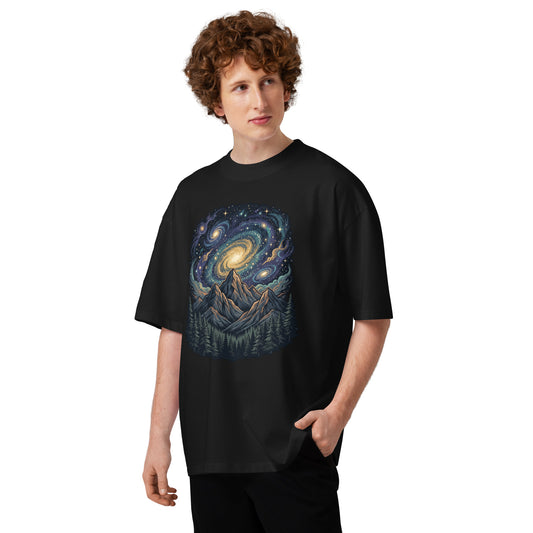 Spiral galaxy above pine-covered mountains on a black oversized high-neck tee, front view