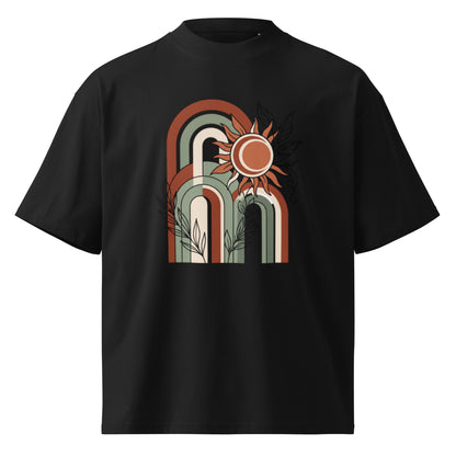 Retro rainbow arches with a rising sun on a black oversized high-neck tee, front view
