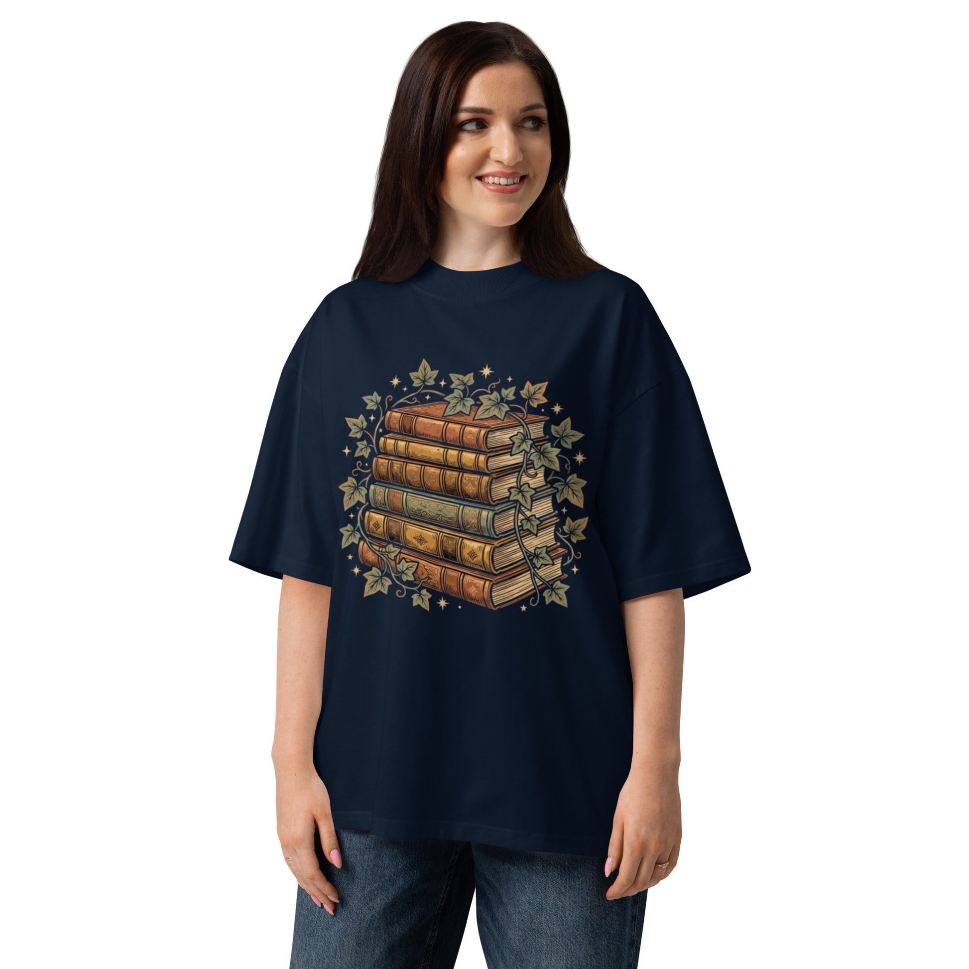 Stack of vintage books wound with ivy on a French Navy oversized high-neck tee, front view