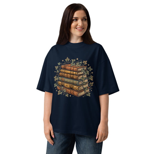 Stack of vintage books wound with ivy on a French Navy oversized high-neck tee, front view