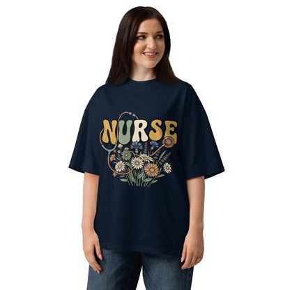 Retro Nurse lettering in a bed of wildflowers on a French Navy oversized high-neck tee, front view