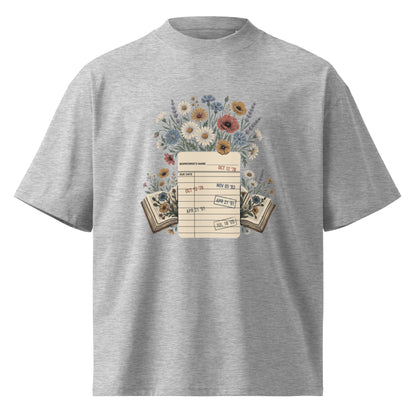 Vintage library due-date card with wildflowers on a heather grey oversized high-neck tee, front view