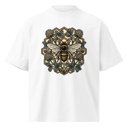 Geometric honeycomb and bee design in teal and gold on a white oversized high-neck tee, front view