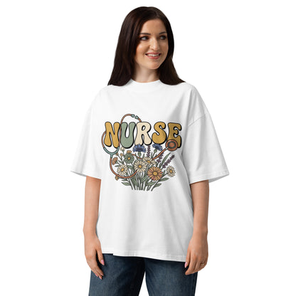 Retro Nurse lettering in a bed of wildflowers on a white oversized high-neck tee, front view