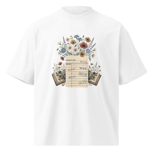 Vintage library due-date card with wildflowers on a white oversized high-neck tee, front view
