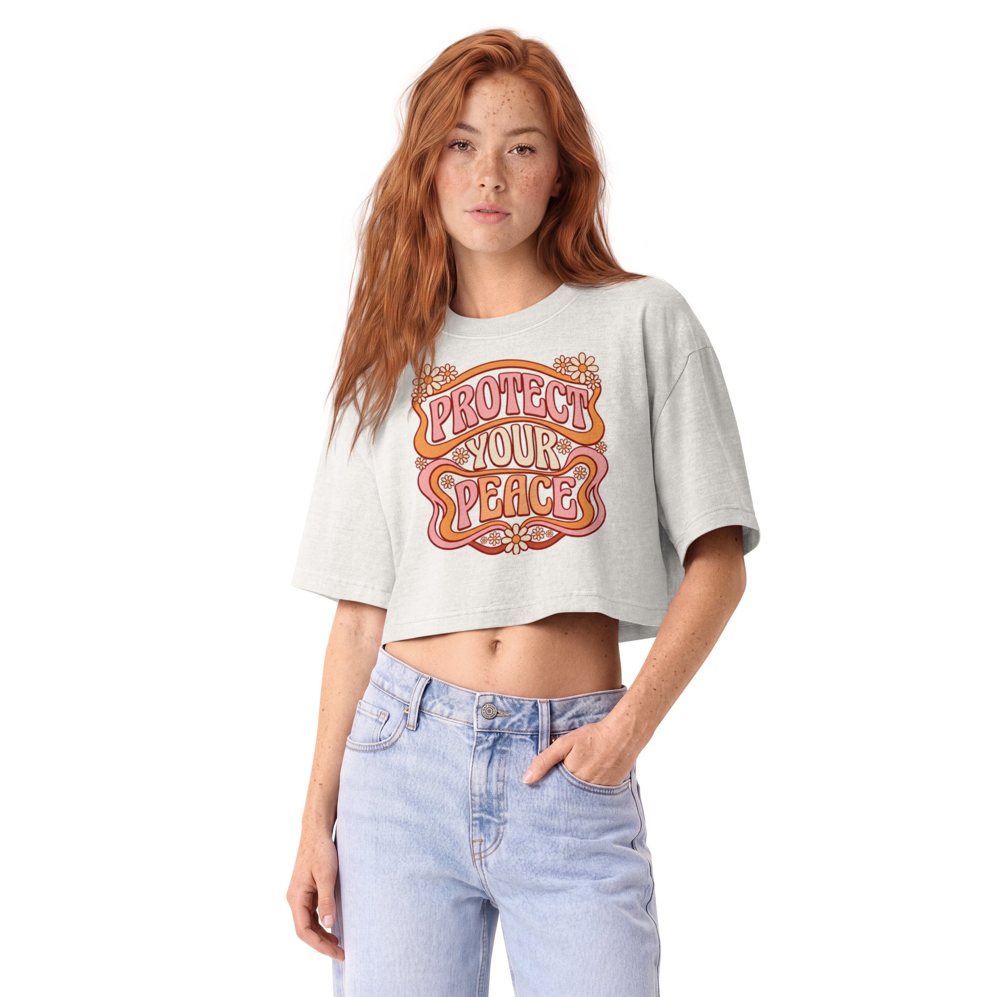 Protect Your Peace in groovy retro lettering on a vintage white garment-dyed cropped tee, front view
